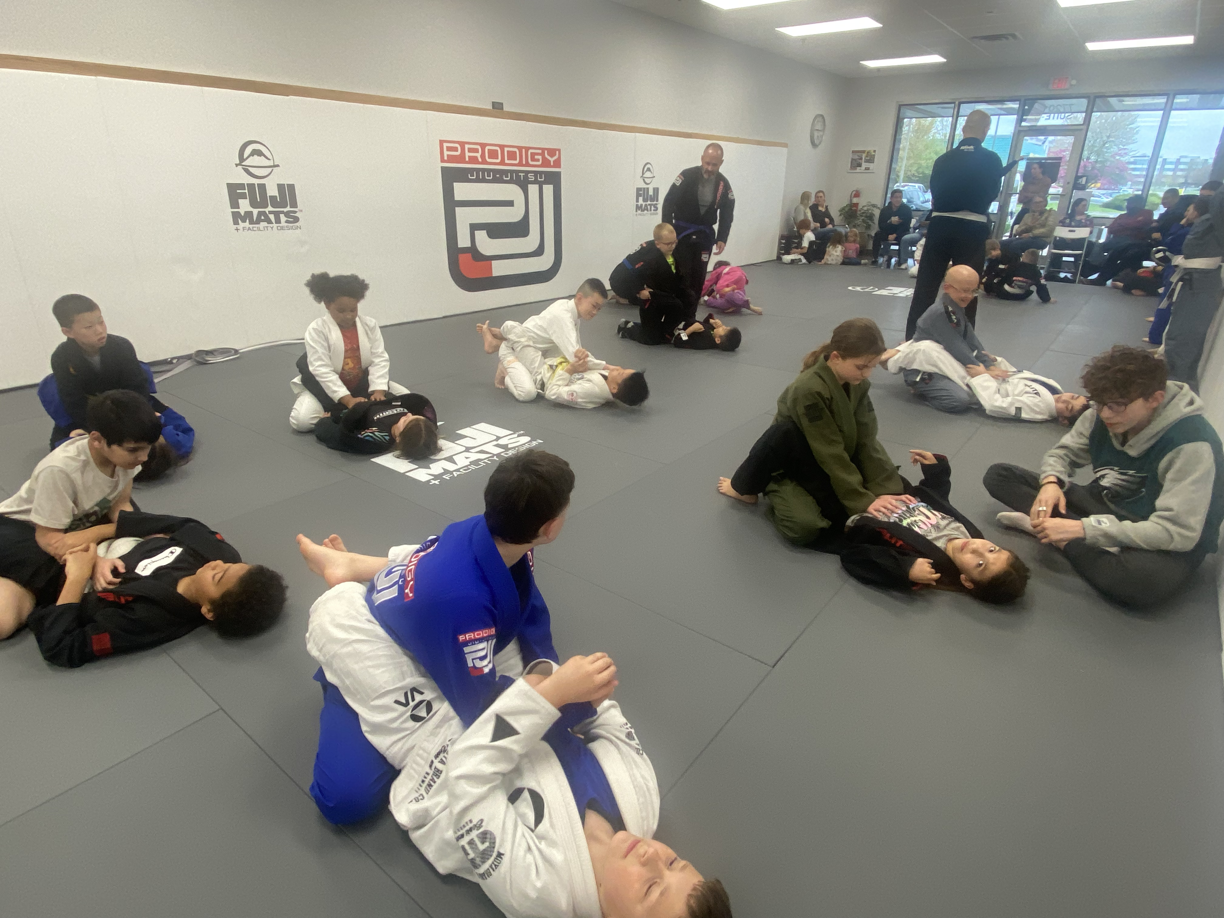 Full class session at Prodigy Jiu-Jitsu academy with students drilling techniques